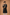 A man modeling a black long kurta.